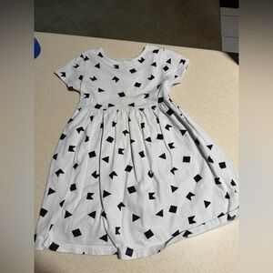 Stylish Kids Dress with Black Geometric Pattern